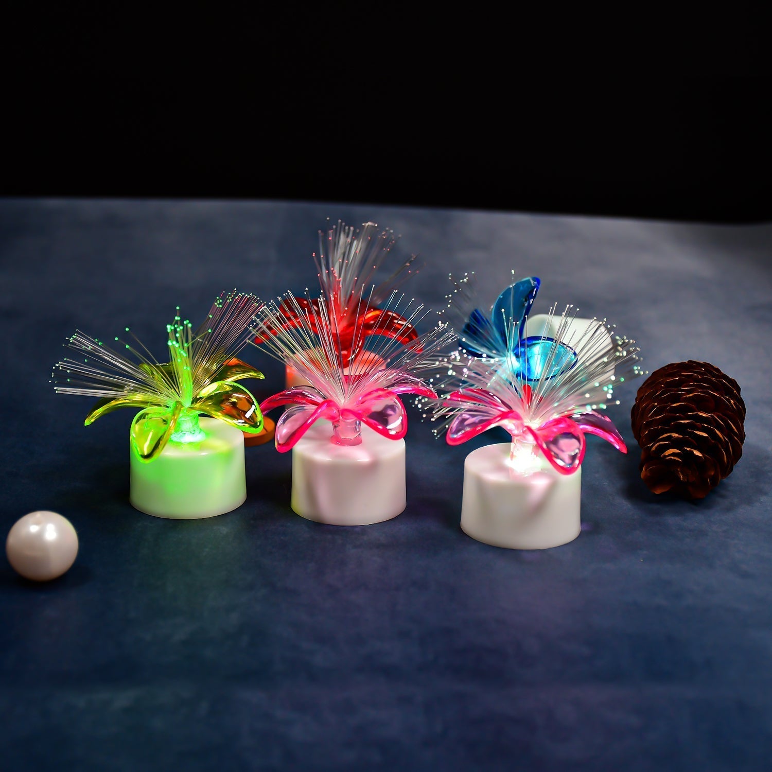 Pack of 12 fiber optic light table centerpieces with mini LED. Pack of 12 fiber optic light table centerpieces with mini LED.